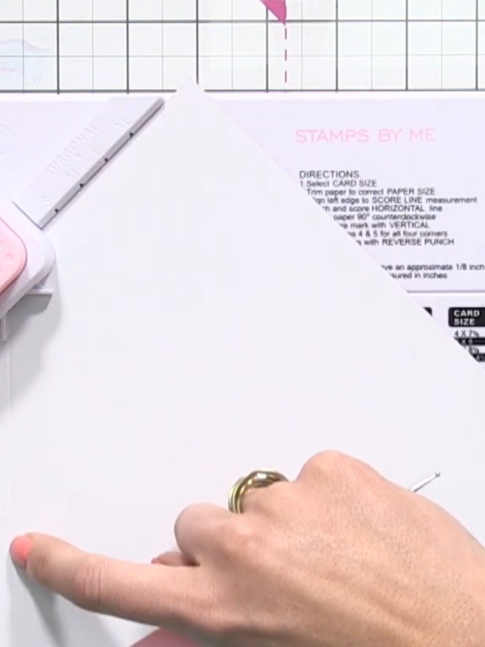 Step 5: Twist the paper and line it back up with the first score line you created on the envelope maker board.