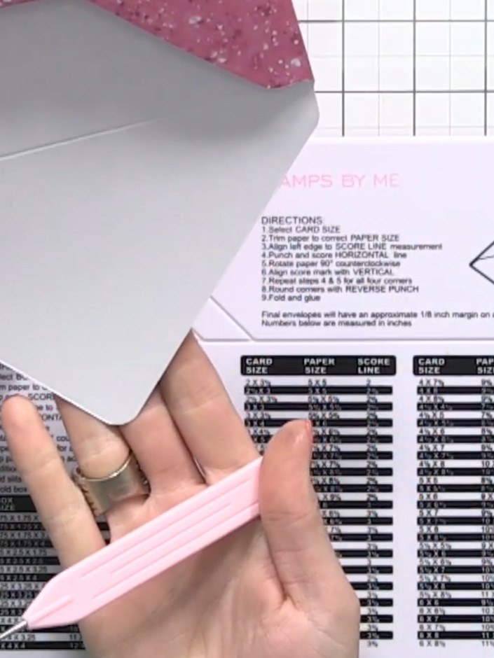 Step 9: Use the corner punch feature on the envelope maker tool to round all four corners of your grey envelope for a 