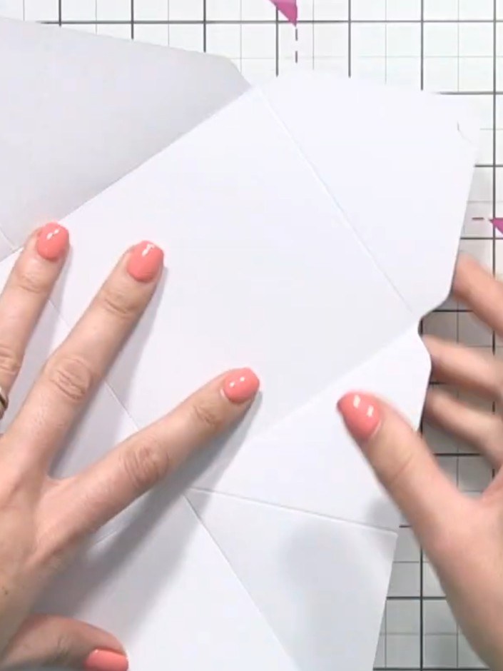 Step 9: Score all the main fold lines on your white card using a scoring tool and ruler to create crisp, neat edges fo