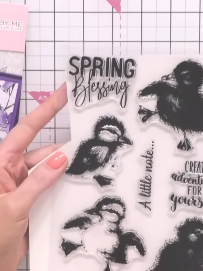 Step 3: Spray the inked stamp with water two to three times to create a watercolour effect.