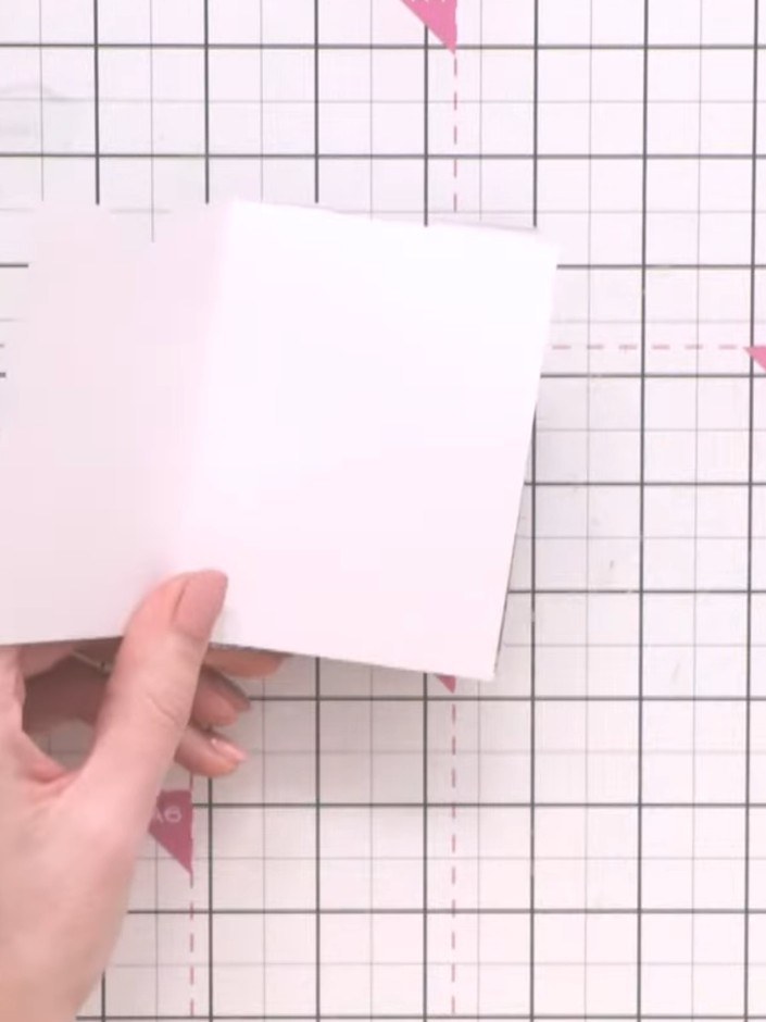 Step 5: Apply PVA glue to the sides and bottom of the patterned paper pocket piece. Position and press it onto the pin