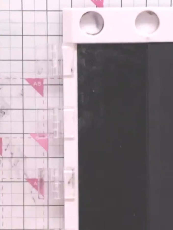 Step 1: Cut a strip of watercolour card. Use an antistatic bag to remove any moisture from the surface of the card.