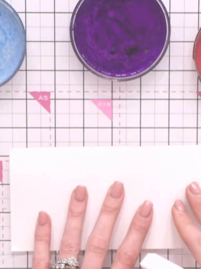 Step 6: Spray your craft mat with water and place the watercolour card face down onto the wet mat to help it stick in 