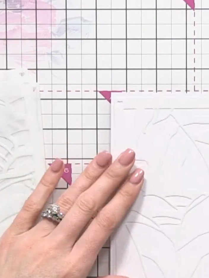 Step 2: Place stencil number one on your card. Apply the ink pad very lightly using minimal pressure to create a soft,