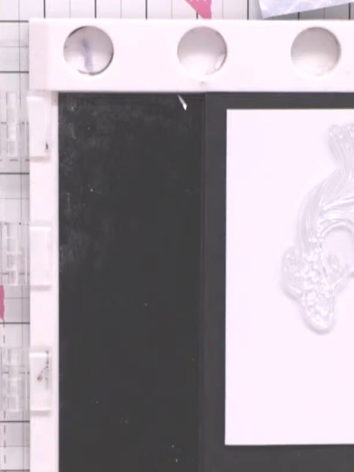 Step 1: Heat emboss the fish stamp in gold onto the front of a 5x7 inch card blank. Position the stamped image central