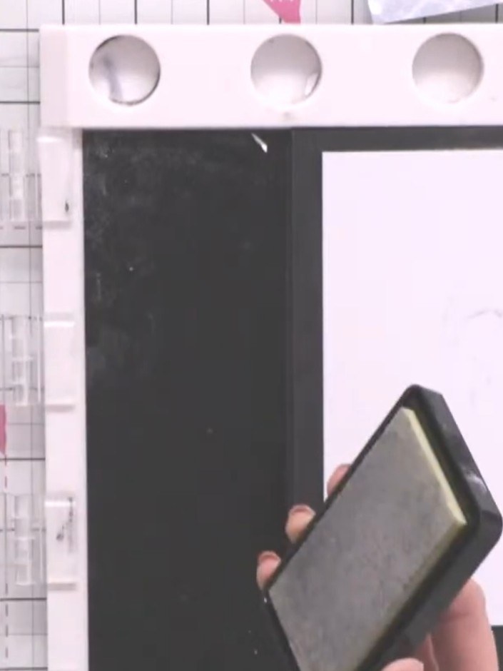 Step 2: Ink the fish stamp with sticky ink pad, ensuring all detail is captured. Stamp the image twice onto white card