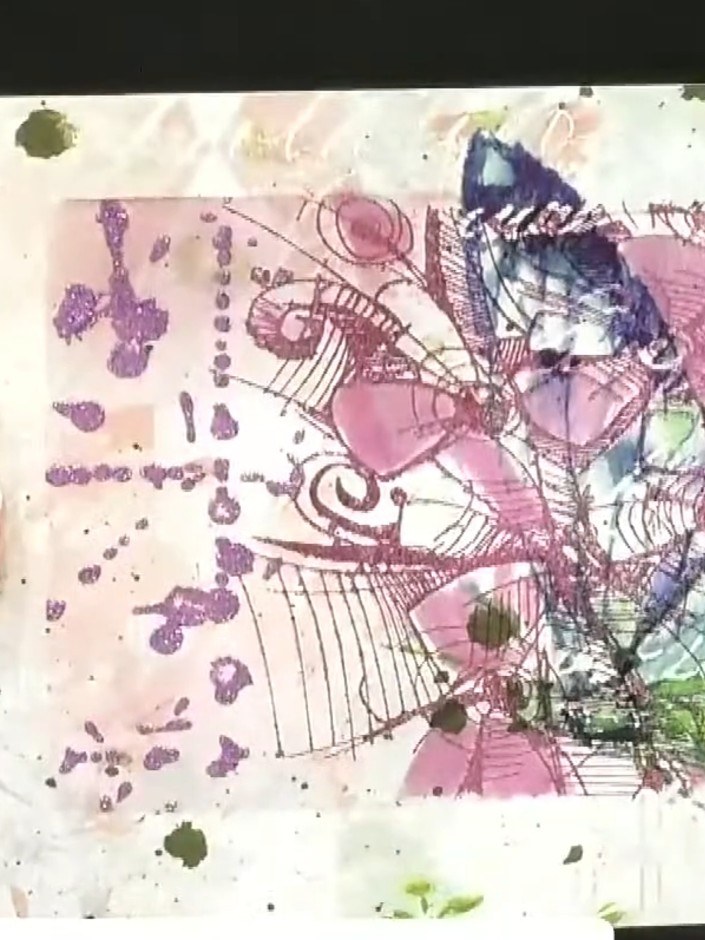 Step 4: Add a splash of water to your glass mat and use a brush to paint with the dye ink, creating a watercolour wash