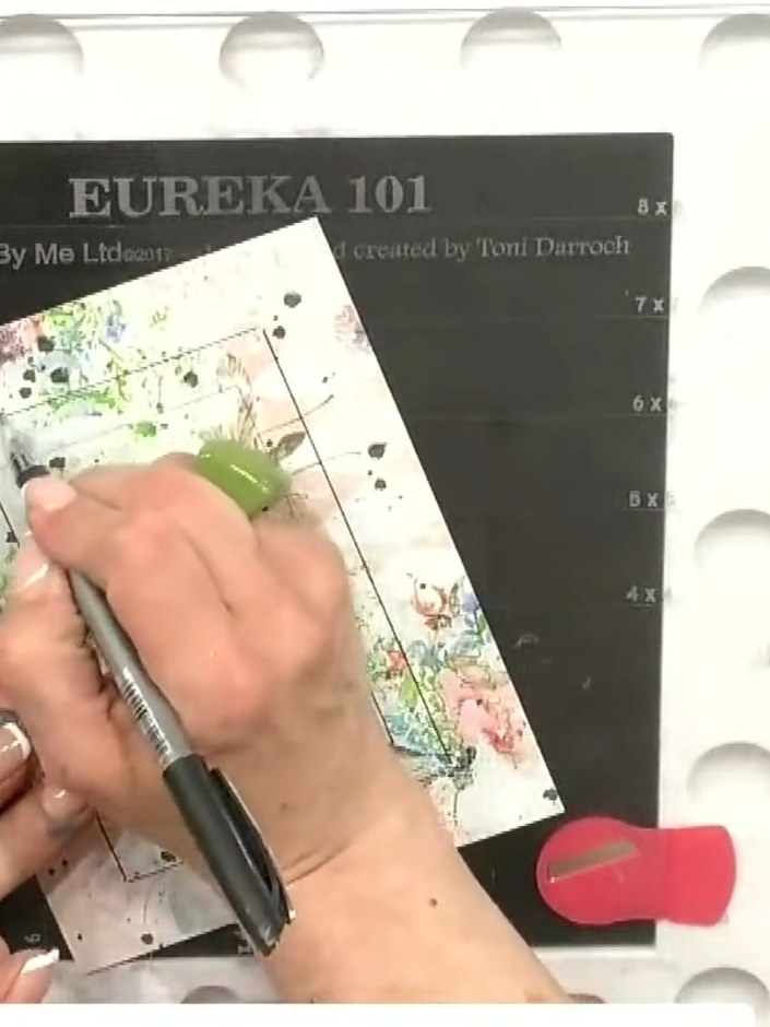 Step 3: Using the pen with the green barrel, draw a frame line along the inside edge of the stencil opening. Keep the 