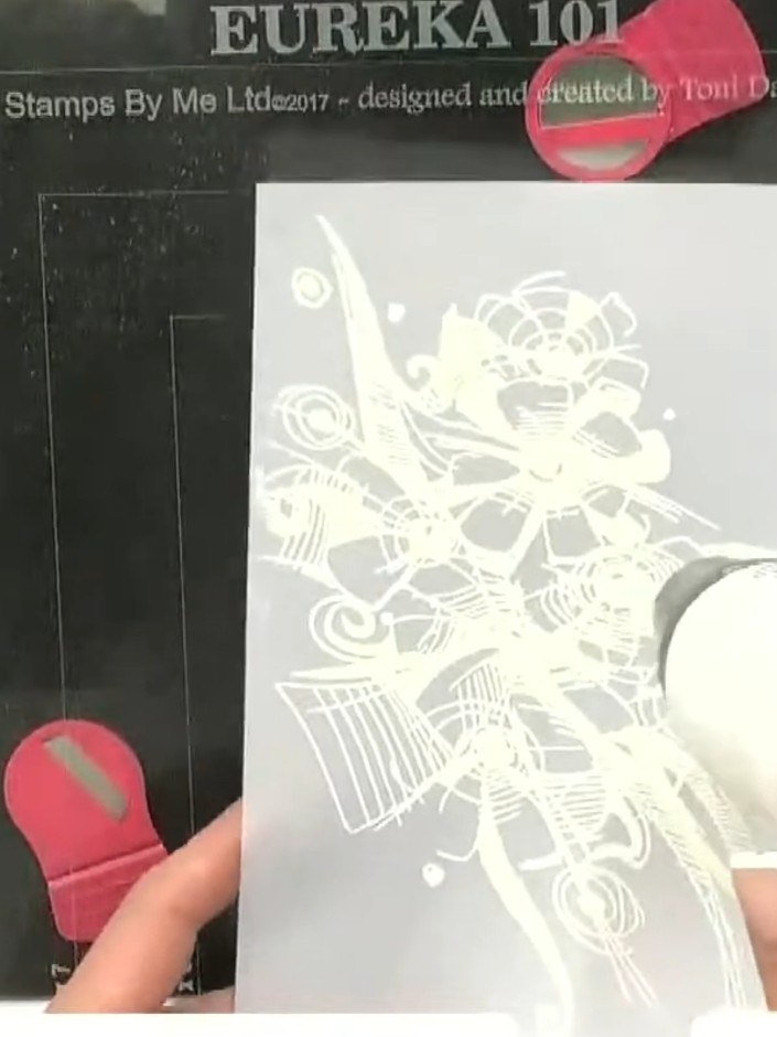 Step 5: Dilute the blending ink with water and apply additional colour washes to the vellum using a brush or sponge. B