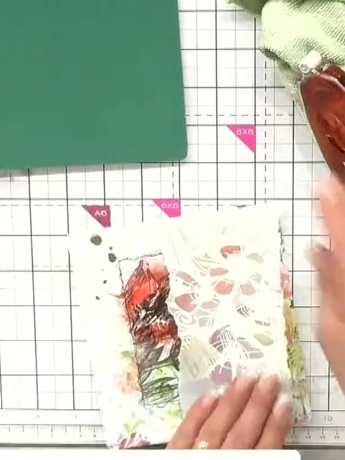 Step 6: Fold the painted vellum over and adhere it to the card from the back only. This allows the vellum to maintain 