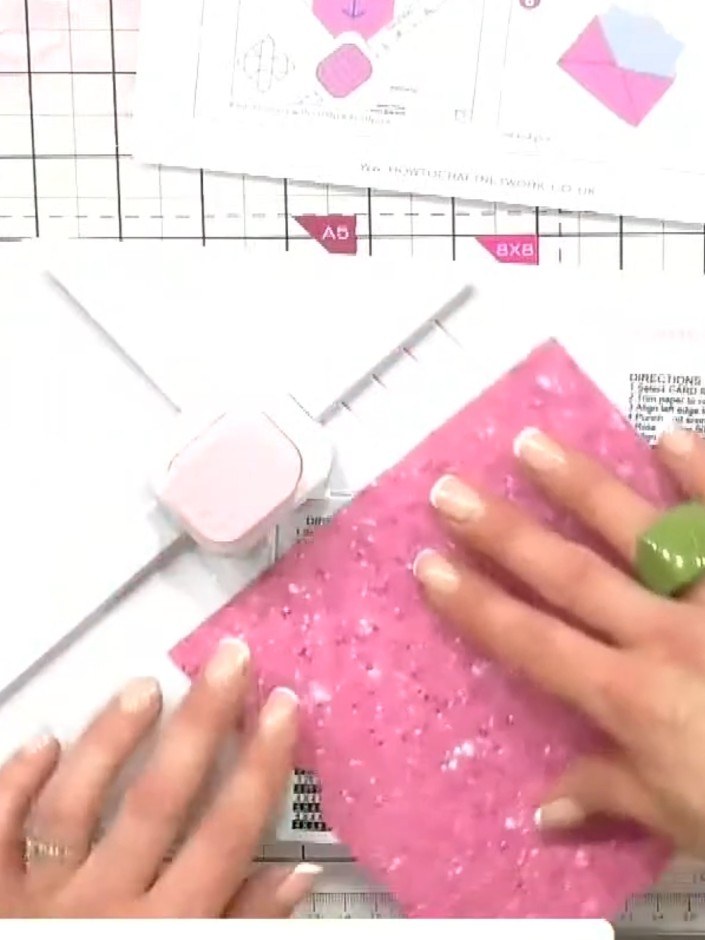 Step 8: Apply adhesive to the envelope flaps and fold them together to complete the envelope. Burnish the folds with a