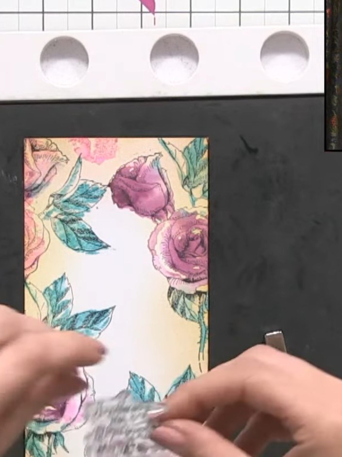 Step 12: Stamp a sentiment from the set in black ink in the centre of the white space on the card panel.