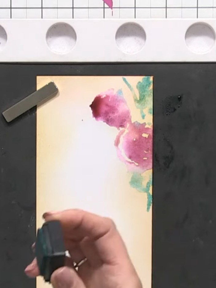 Step 9: Spray the stamp three times with water for a softer, more blended effect. This creates a different look compar