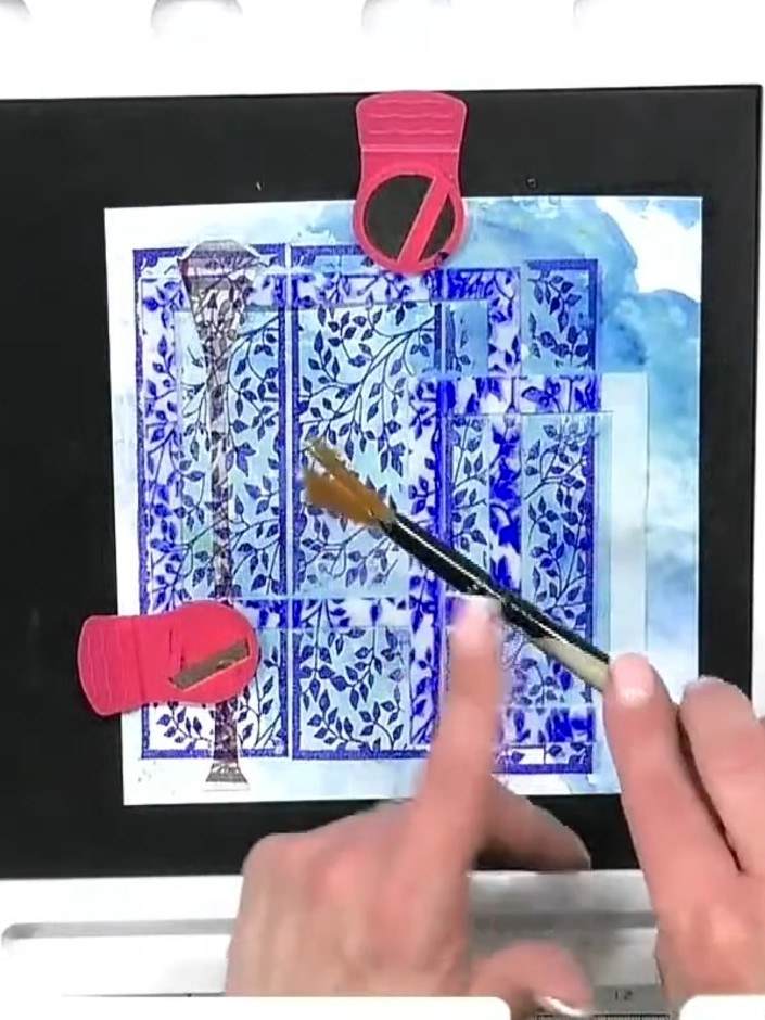 Step 6: Apply clear embossing powder to the wet stamped image. Use a heat tool to melt the embossing powder until it s