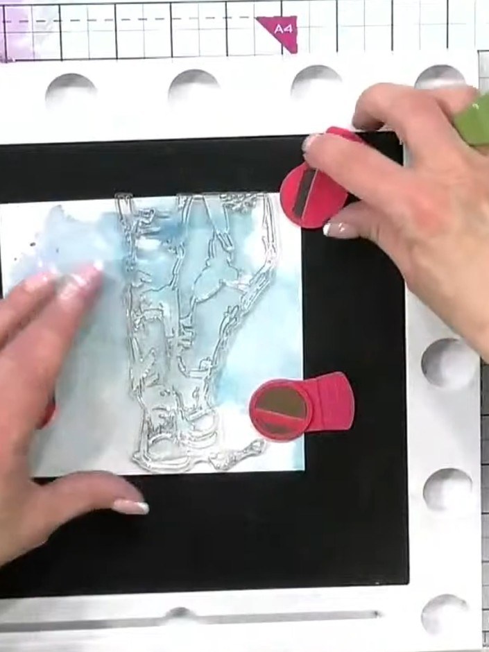 Step 1: Stamp one of the character variations from the Perfectly Paired stamp set onto your pre-made inky background u