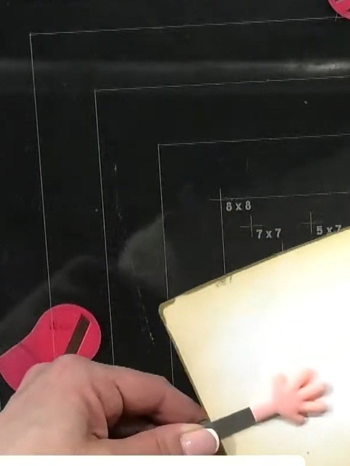 Step 6: Fold each of the card pieces in half. Gently sculpt and curve the folded pieces with your hands to create dime