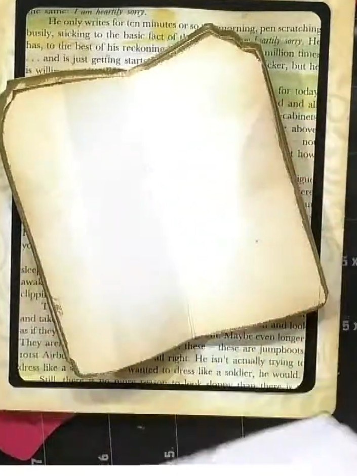 Step 8: Layer the pieces together, starting with the base card. Add foam pads between each layer to create dimension. 