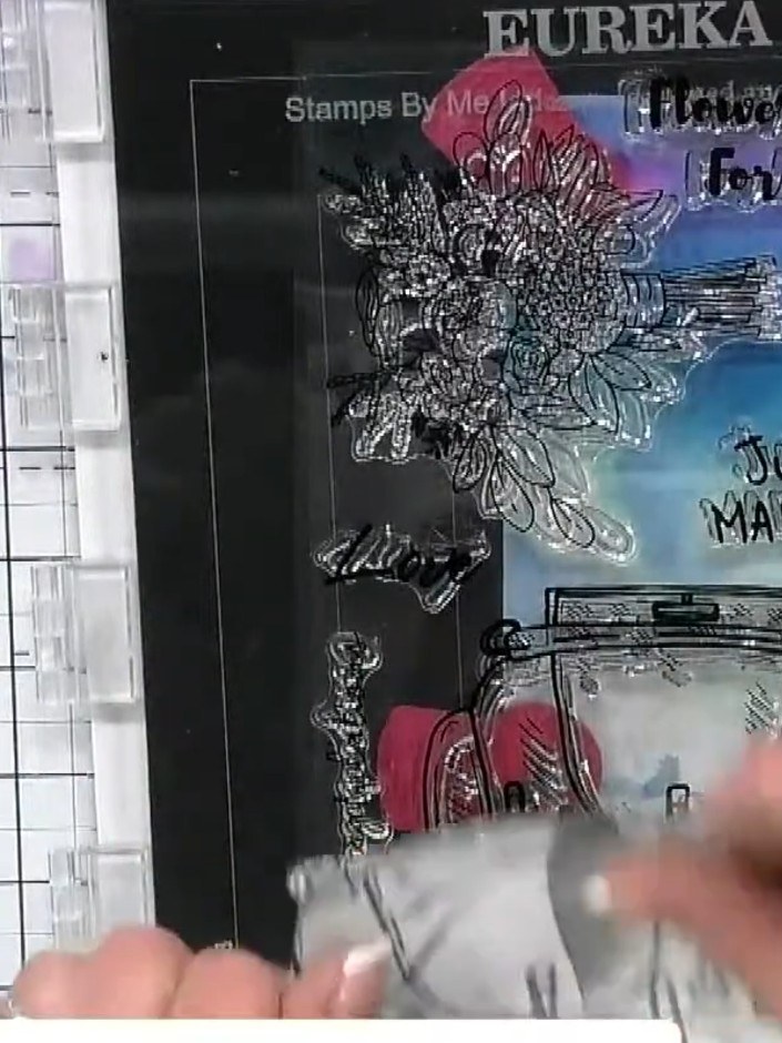 Step 1: Create a decorative background on white cardstock using ink blending techniques to achieve a textured, colourf