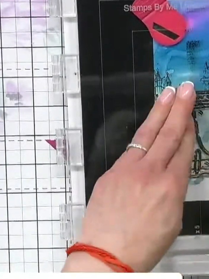 Step 10: Mount the finished stamped panel onto a black card base, then layer onto a forest green card base to create a 