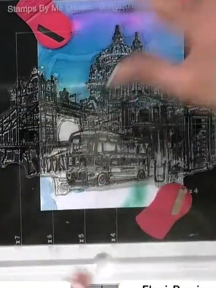 Step 3: Position the mask on your watercolour background, lifting the bottom edge slightly away from the surface to av