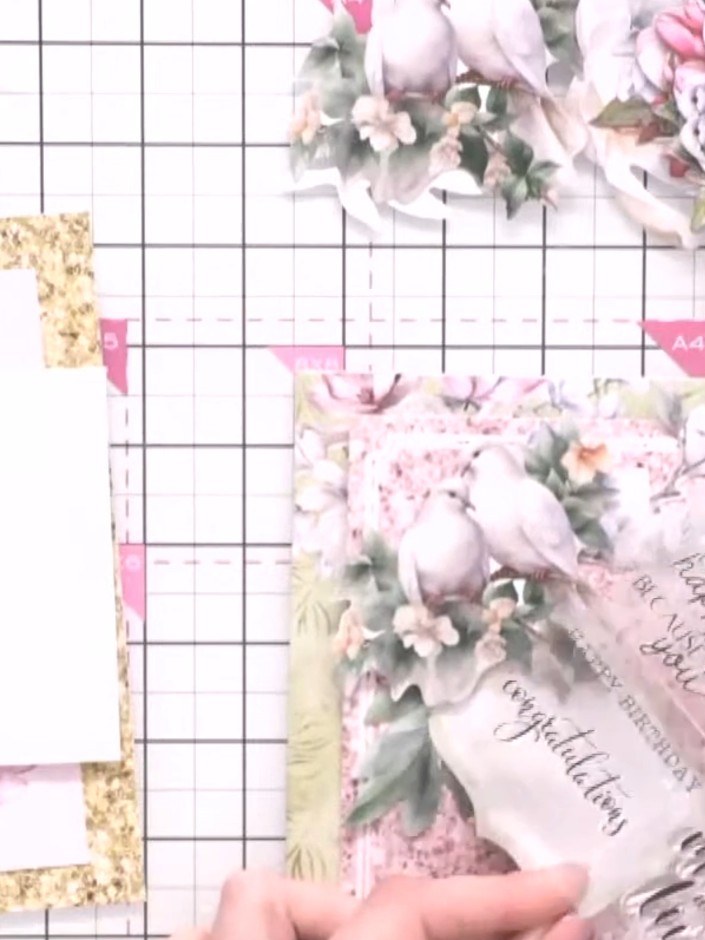 Step 9: Decorate your envelope using the rub-ons from the kit. Select a design, peel back the transparent sheet, posit