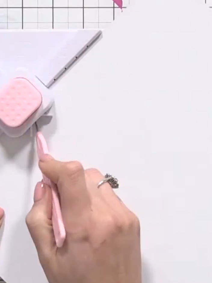 Step 3: Using the envelope punch board, score the white cardstock at the 4.5 inch mark. This is the only measurement y