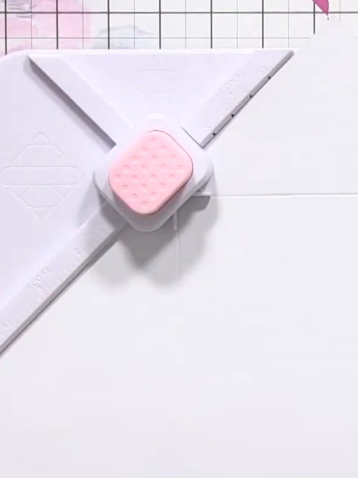 Step 6: Rotate the paper 90 degrees anticlockwise. Position the paper so that the score line you just made aligns with