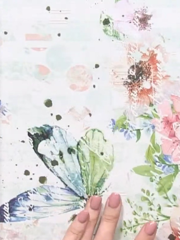 Step 3: Using your ruler and trimmer, cut out two small squares from opposite sides of the decorative paper as marked 