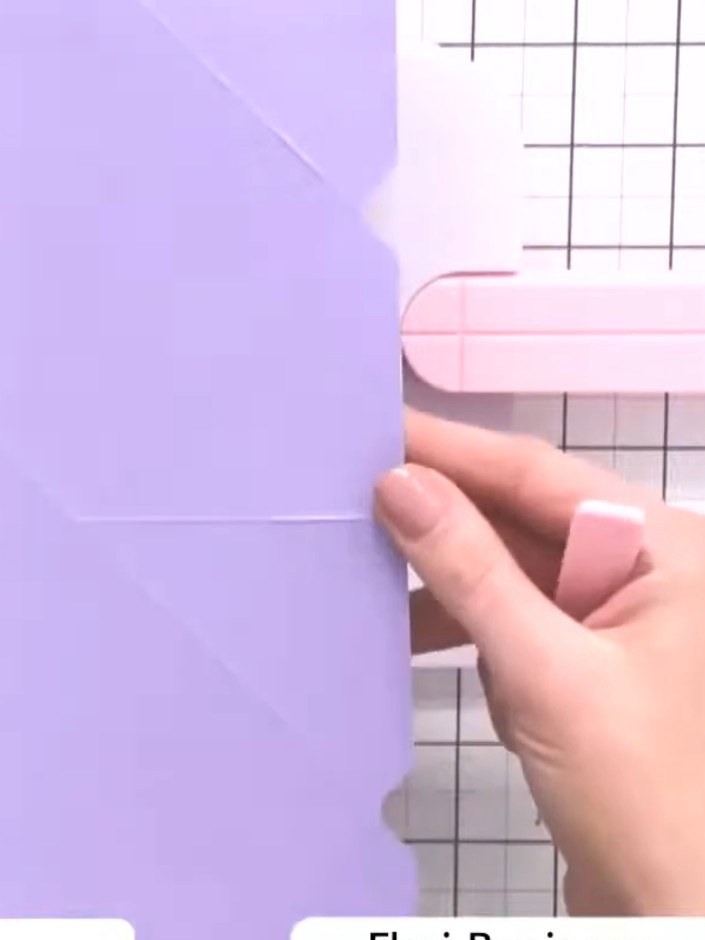 Step 10: Using your bone folder or scoring tool, score firmly along all the fold lines on your purple card to create cl
