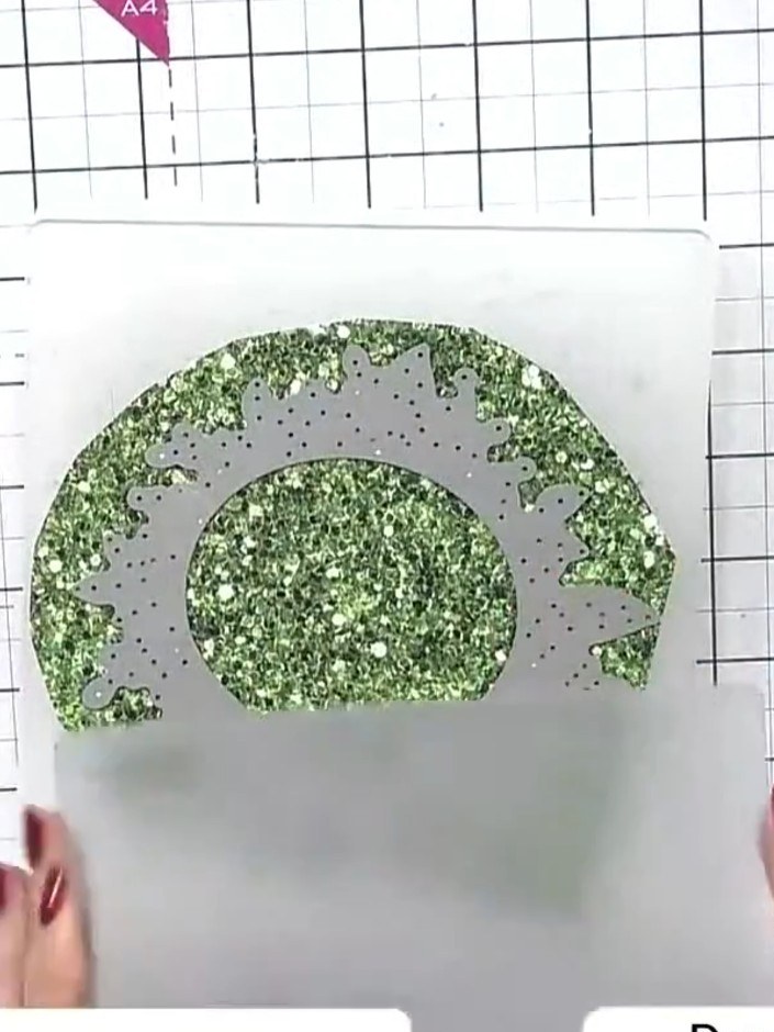 Step 4: Cut out some of the small flower embellishments from the Wonderful Moments collection using scissors or a craf