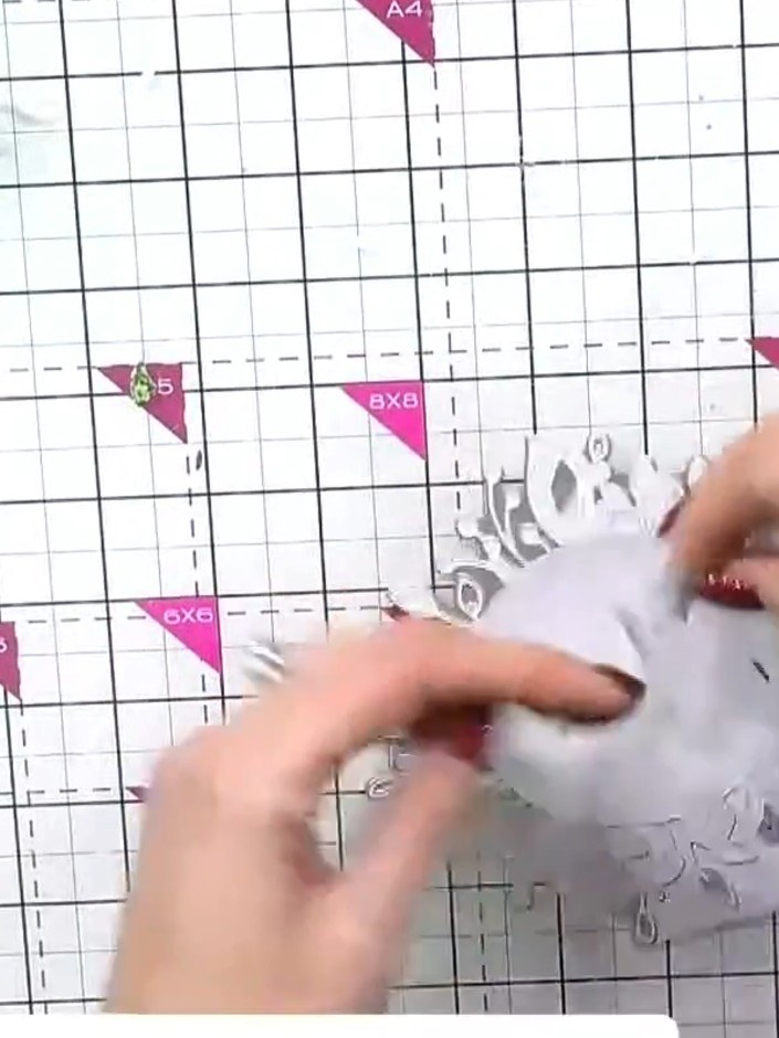 Step 6: Use your fingers to gently pad and lift the wreath die-cut slightly to add dimension. This will make the wreat