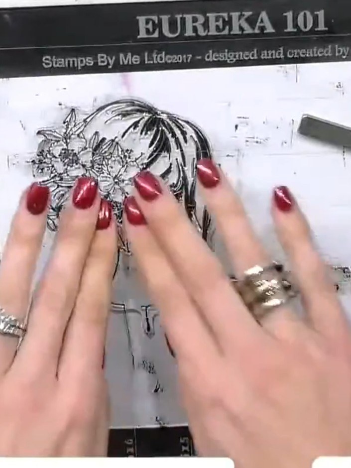 Step 2: Stamp the floral image onto white card using black ink. The stamped image shows a woman's profile with flowers