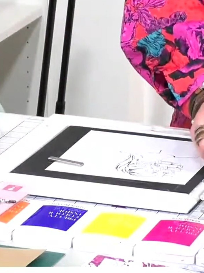 Step 5: Select a yellow ink pad and add touches of yellow ink to areas of the stamped flowers to create additional col