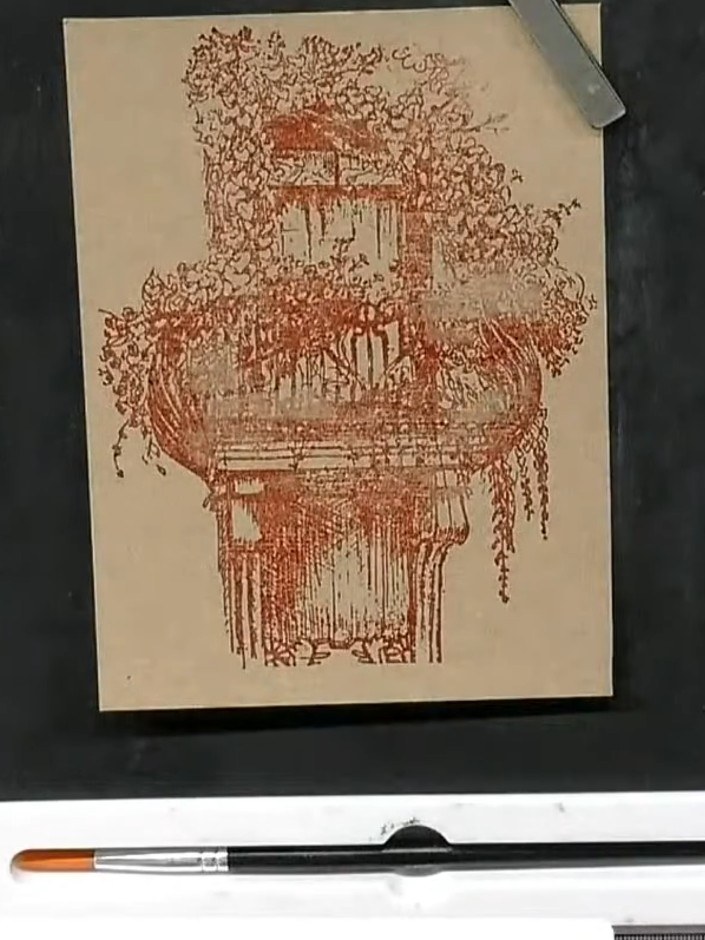 Step 7: Stamp the image again in black ink over the dried watercoloured version to bring back the detail and definitio
