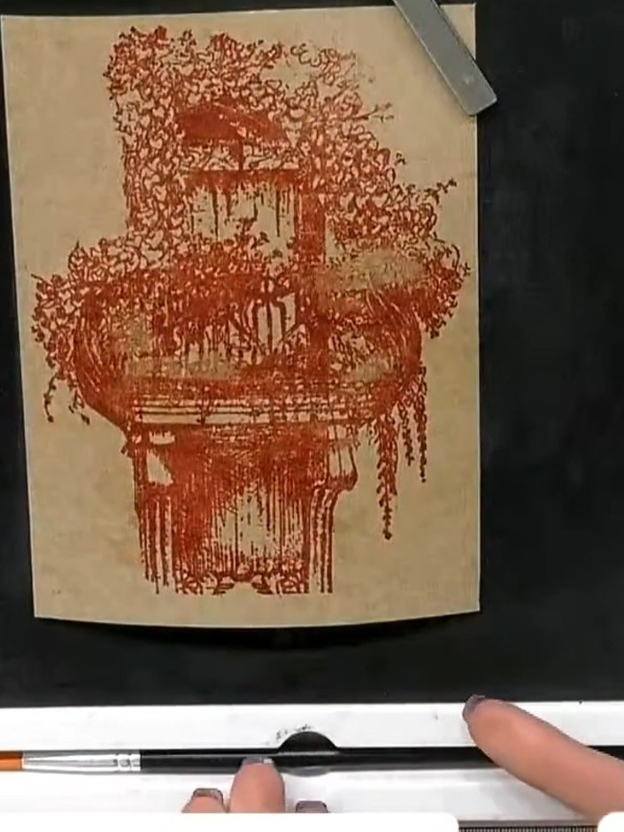 Step 9: Use a black ink pad to run around all four edges of the stamped kraft cardstock, creating a thin border frame 