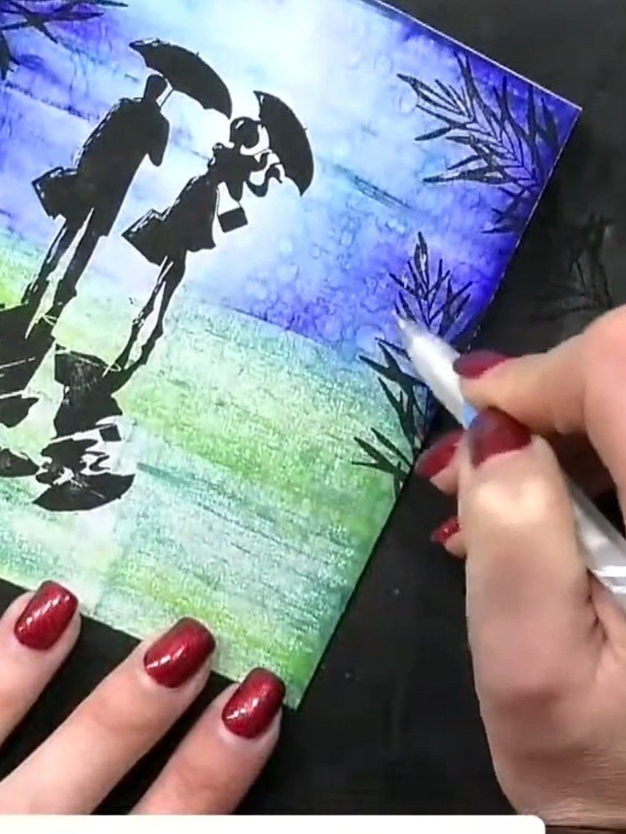 Step 13: Using a water brush or wet paintbrush, wet a circular area in the sky section where you want a moon to appear.