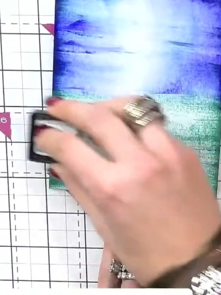 Step 6: Wet the entire background card with water using a jumbo foam roller. Apply water evenly across the surface to 