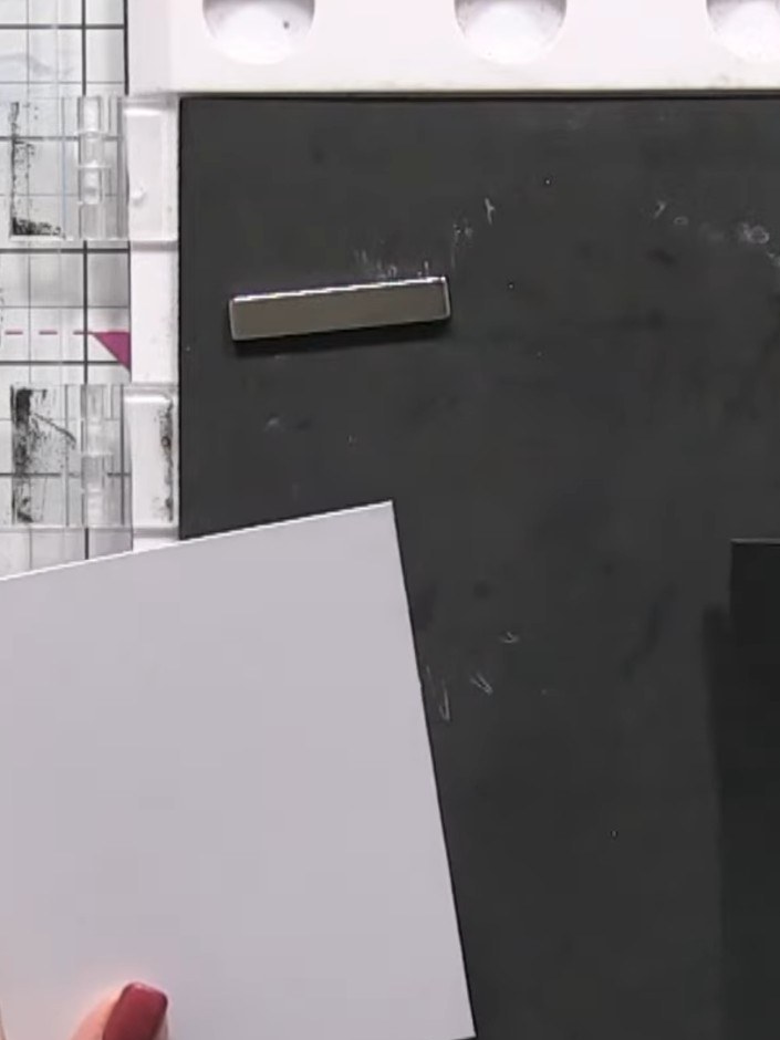 Step 1: Cut two pieces of card to the same size, measuring 5 inches by 4 inches - one from white cardstock and one fro