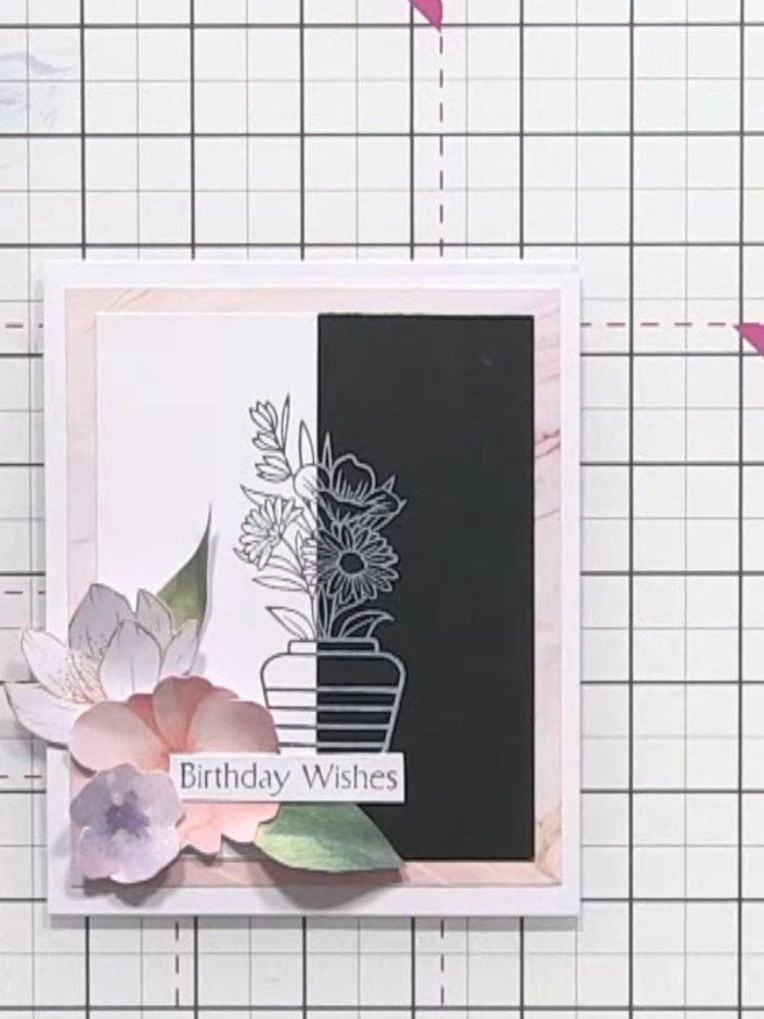 Step 12: Trim the 'Birthday Wishes' sentiment to size. Use adhesive tape to attach it to the card front, positioning it