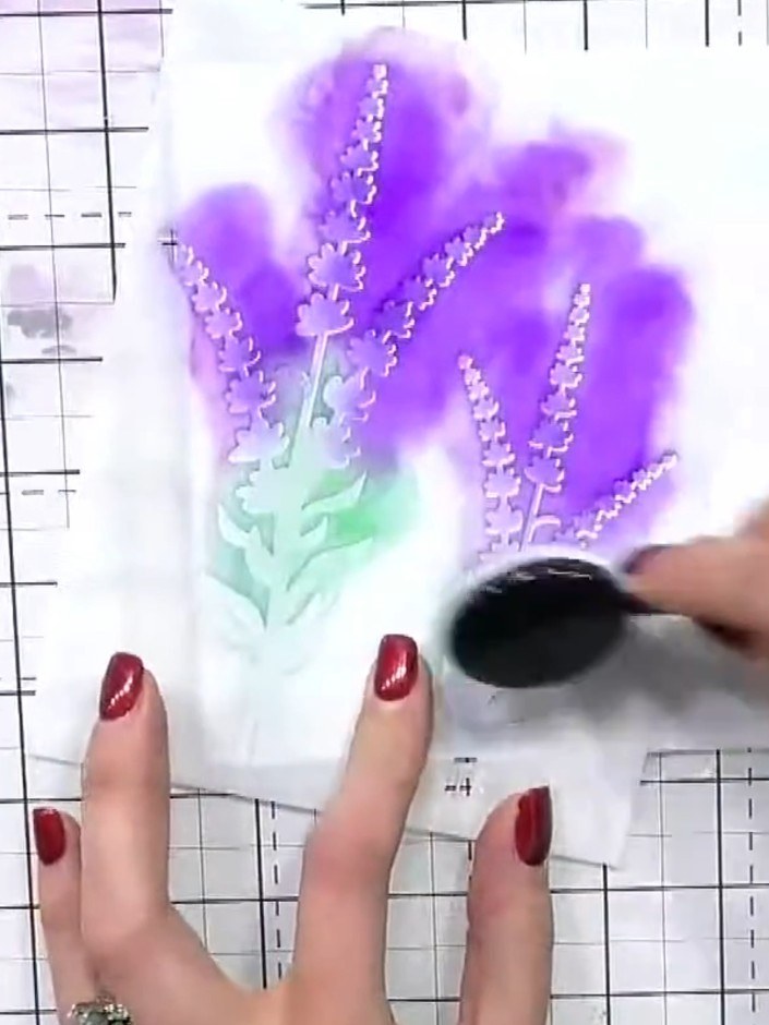 Step 6: Move the stencil slightly to a different position and apply another layer of purple ink from a different angle