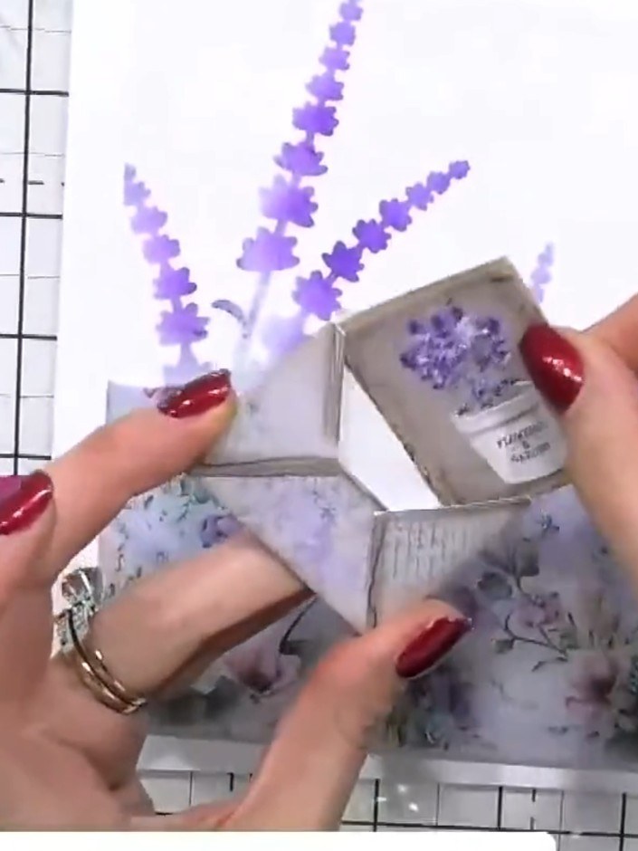 Step 3: Fussy cut several ephemera elements from the decorative paper, including small envelopes and other decorative 