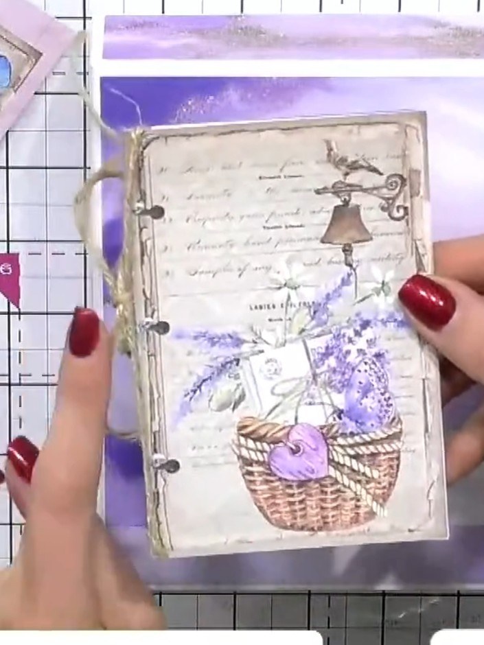 Step 7: Add additional embellishments to complete your album cover. Attach fussy-cut elements such as lavender sprigs 