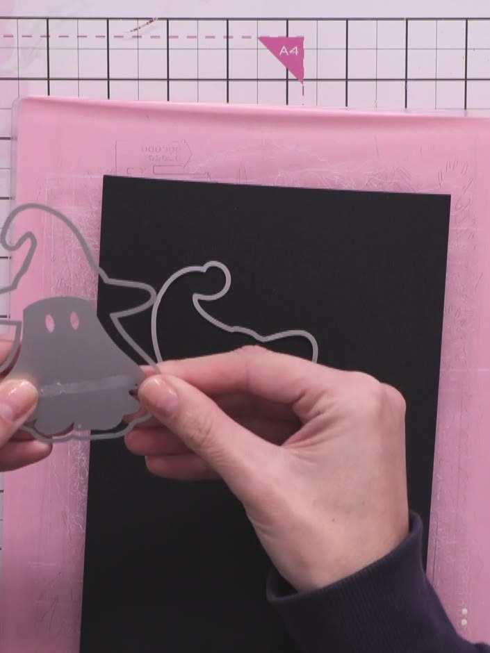 Step 1: Cut two identical gnome exterior die cuts from black card stock using the gnome die. These will form the outer