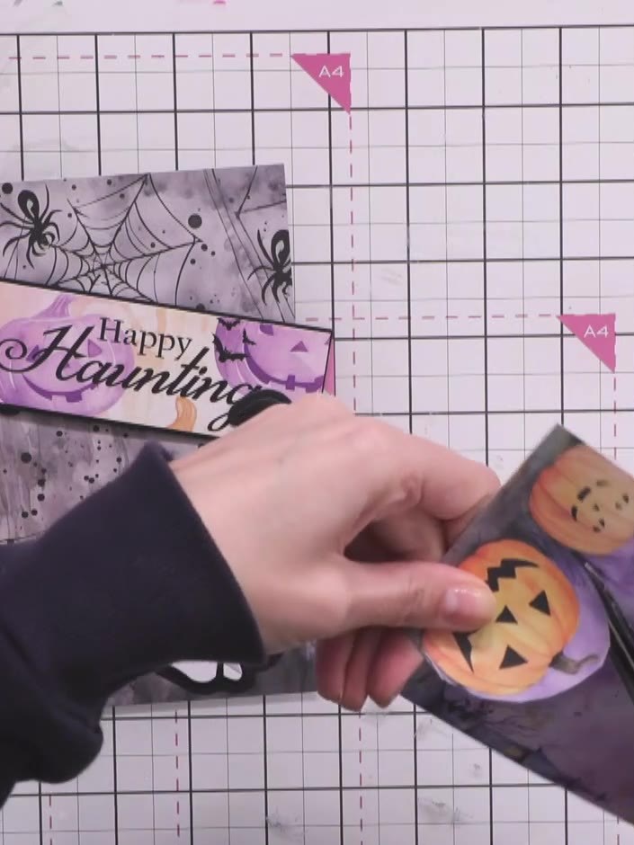 Step 11: Fussy cut a small pumpkin from the decorative paper pack. This will add a pop of colour to your card.