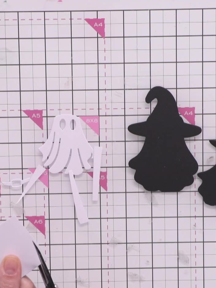 Step 5: Tear or cut random strips from white scrap paper to create the mummy wraps. These strips will be used to wrap 