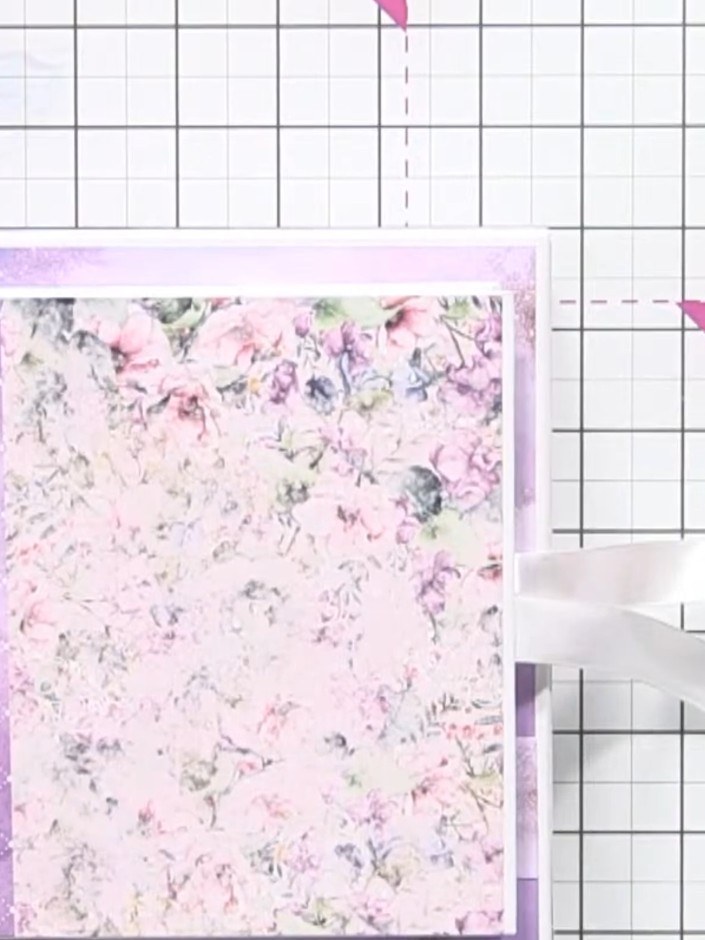 Step 1: Layer patterned papers from the Ethereal Love pad onto the album cover. Position the floral paper with the pur