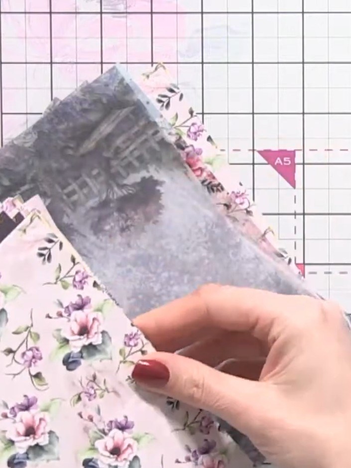 Step 4: Glue the sides of the folded floral bouquet piece together to create dimension and an arched effect. This will
