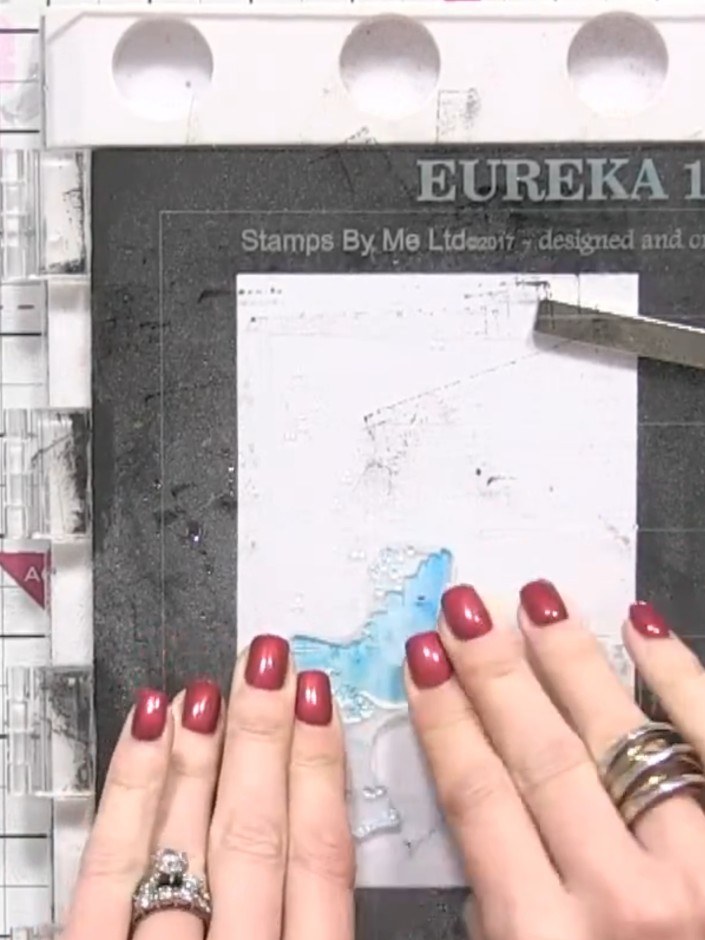 Step 1: Spot teal ink onto the colour stamp in random places using the corner of your ink pad. Create an abstract patt