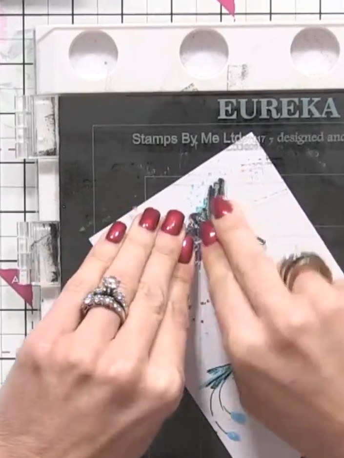 Step 11: Select a sentiment stamp from your collection and stamp it at the bottom of the card panel. Position the senti