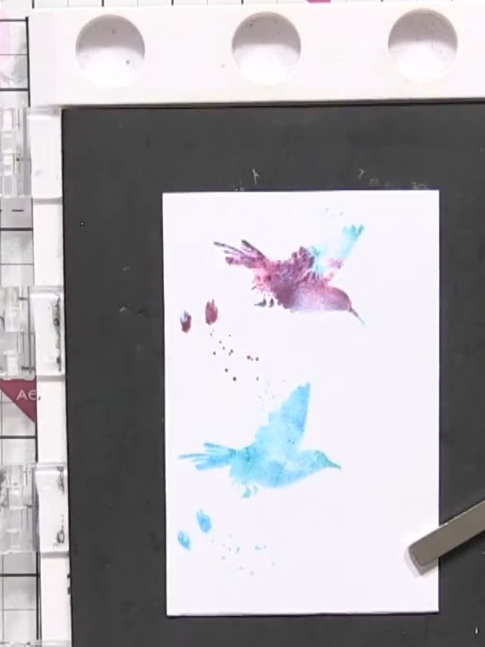 Step 5: Create a second watercolour background on another piece of white card stock using teal and purple inks. Positi